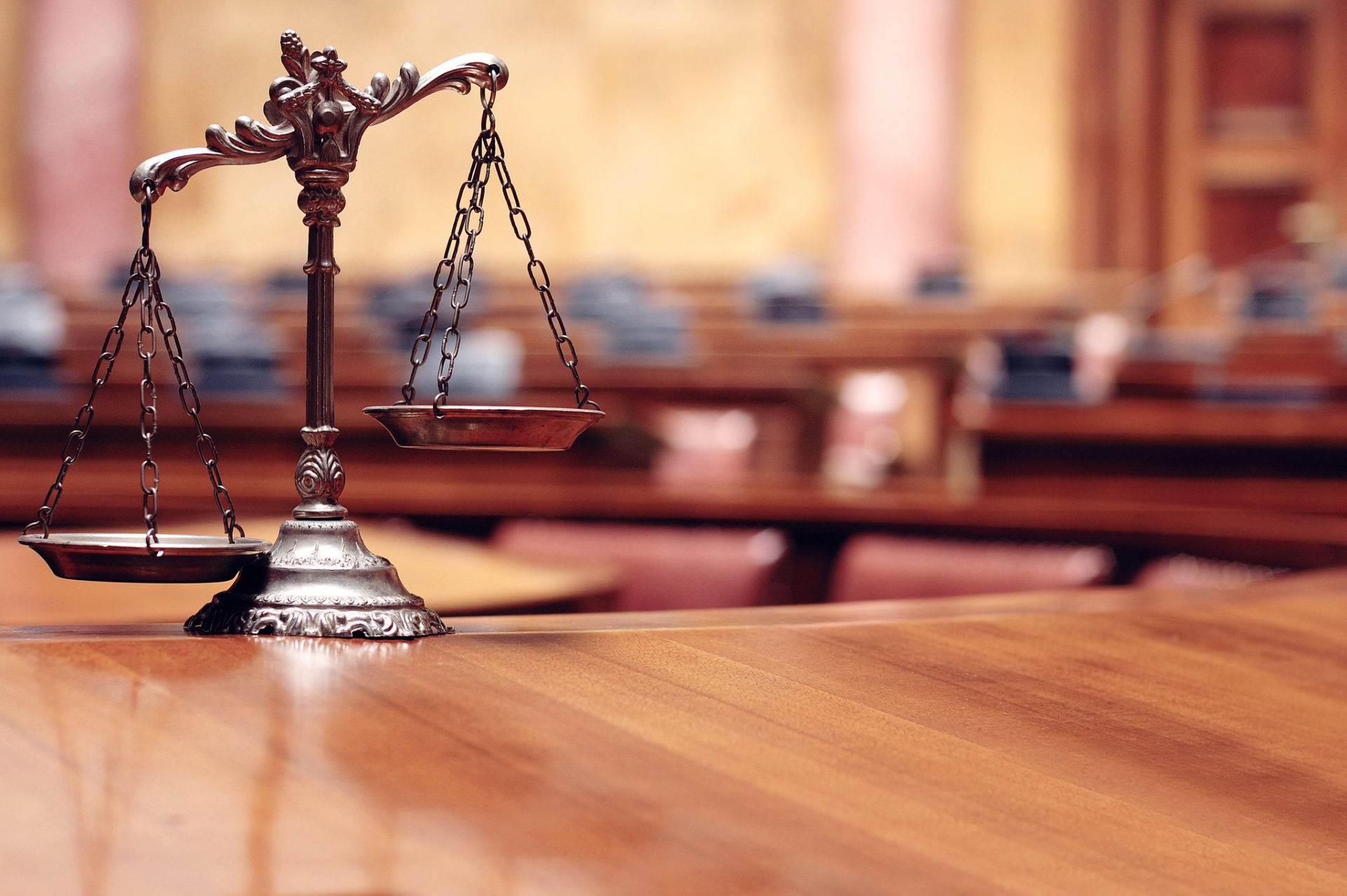 Close up of legal scales in a courtroom
