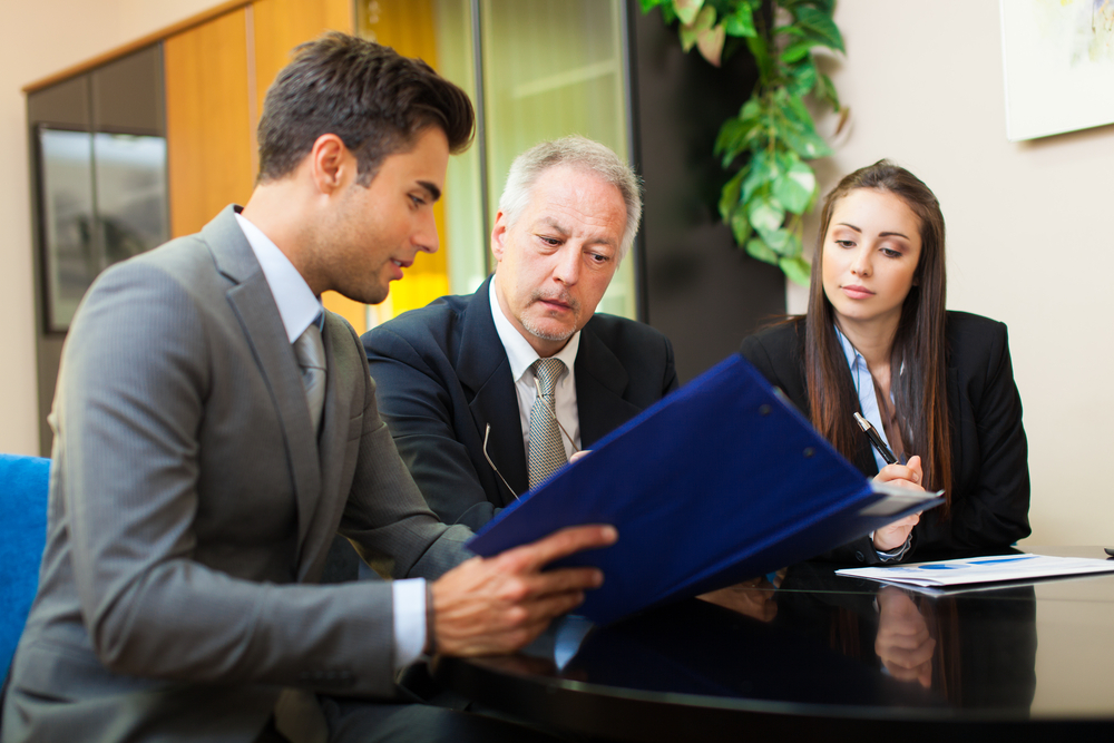 Paralegals in Toronto working with a client