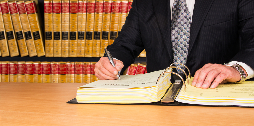 A man studying for paralegal course in