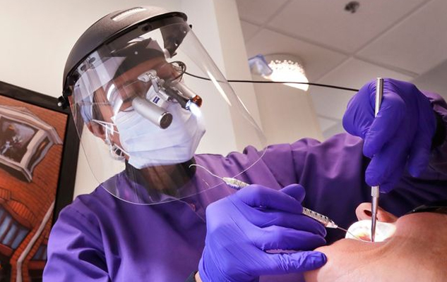 Dental assistants working on dental impressions
