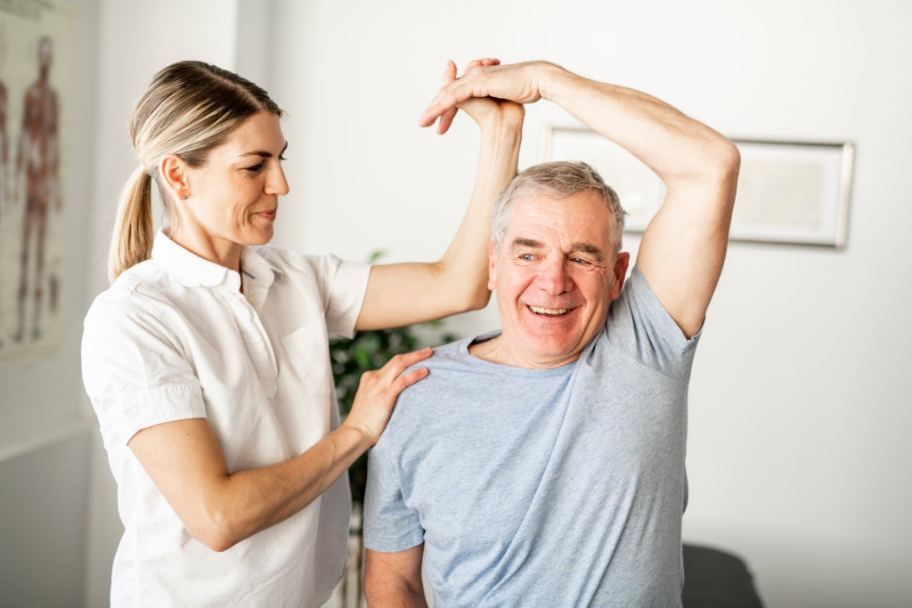 A person stretching a person's arm